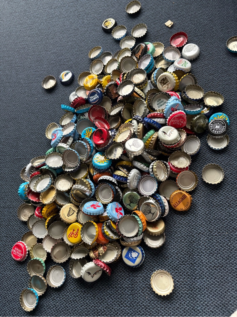 ~380 assorted bottle caps